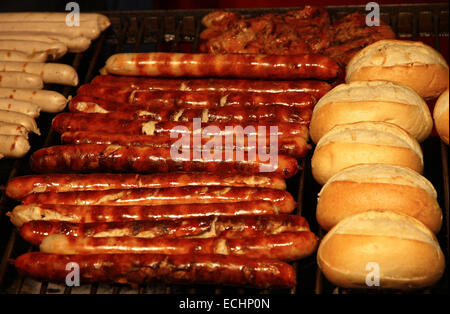 Traditional fresh german sausages grilled on wire rack outdoor Stock Photo