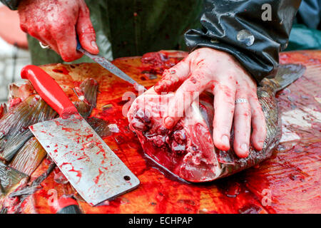 Cutting carp for customers. Street stall, Prague, Czech Republic Stock Photo