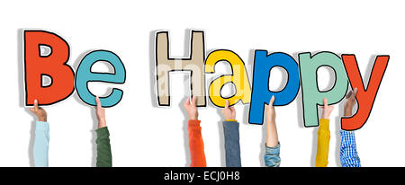 Group of Hands Holding Word Be Happy Stock Photo