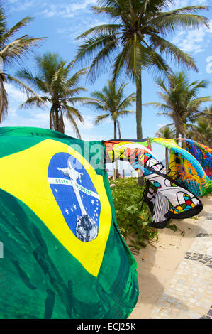 Colorful canga beach blankets blowing in the wind on Ipanema Beach Rio de Janeiro Brazil Stock Photo