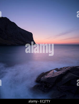 Twilight over coastline at Horseid beach, Moskenesøy, Lofoten Islands, Norway Stock Photo