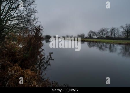 Salisbury, Wiltshire, UK. 16th December, 2014. UK weather. Misty morning on the River Avon Salisbury viewed from Churchill Gardens  Credit:  Paul Chambers/Alamy Live News Stock Photo