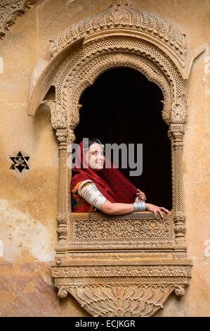 India, Rajasthan, Jaisalmer, Patwon ki Haveli, Young woman Stock Photo