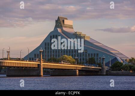 Latvia (Baltic States), Riga, European capital of culture 2014, the Akmens bridge over the river Daugava with a view of the national library Stock Photo