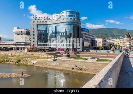 Republic of Macedonia, Skopje, downtown, the Vardar river and the T-Mobile building Stock Photo