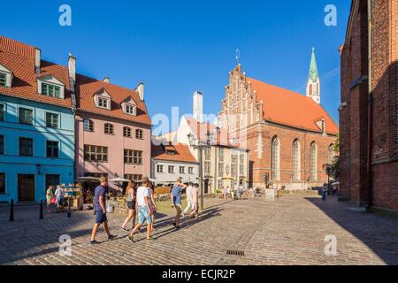 Latvia (Baltic States), Riga, European capital of culture 2014, historical centre listed as World Heritage by UNESCO, old town, street Skarnu and Saint Jhon's church Stock Photo