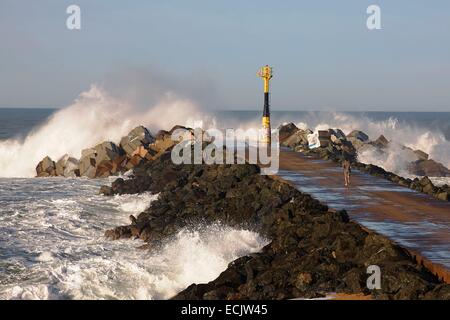 France, Pyrenees Atlantiques, Anglet, La Barre, Wave crashing on the pier Stock Photo
