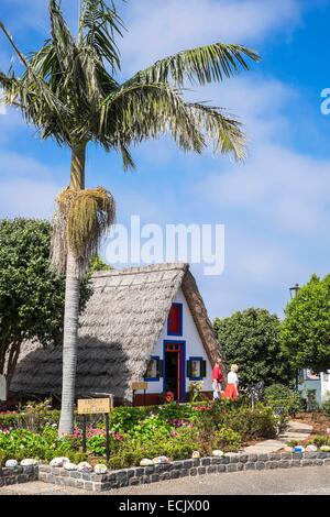 Portugal, Madeira island, Santana on the north coast, famous for its typical houses with a roof of straw thatch Stock Photo