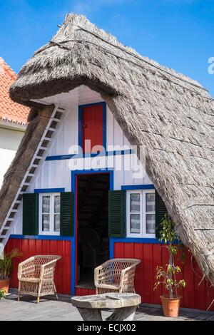 Portugal, Madeira island, Santana on the north coast, famous for its typical houses with a roof of straw thatch Stock Photo