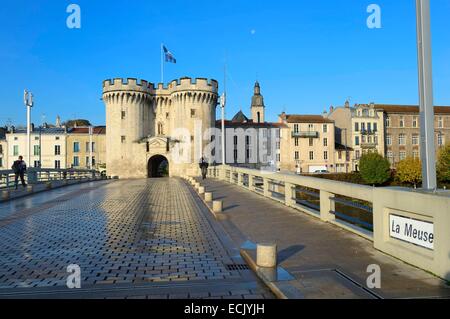 France, Meuse, Verdun, Porte Chaussee, gate of the 15th century, official entry of the city since its construction, defense tower of the great wall that encircled the city in the medieval seen from the Nation Place and the bridge over the Meuse River Stock Photo