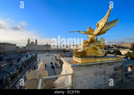 France, Meurthe et Moselle, Nancy, Place Stanislas (former Place Royale) built by Stanislas Leszczynski in the 18th century, listed as World Heritage by UNESCO, statue on the Triumph Arch (Here Gate), the City Hall and the Cathedral in the background Stock Photo