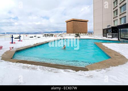 Canada, Quebec province, Quebec City in winter, the outdoor swimming pool on the roof of the Hilton Stock Photo