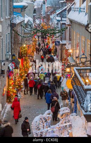 Canada, Quebec province, Quebec City in winter, the Petit-Champlain in Old Quebec declared a World Heritage by UNESCO, the Rue du Petit-Champlain in the dusk Stock Photo