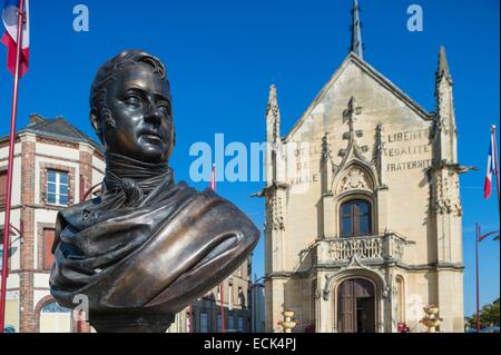 France, Eure, Breteuil (or Breteuil sur Iton), bust of Baron Jacques Laffitte erected on the square of the same name and the neo Gothic style town hall in the background Stock Photo