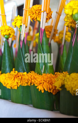 Vertical view of marigold pyramids for sale in Pak Ou or Tam Ting caves (selective depth of field). Stock Photo