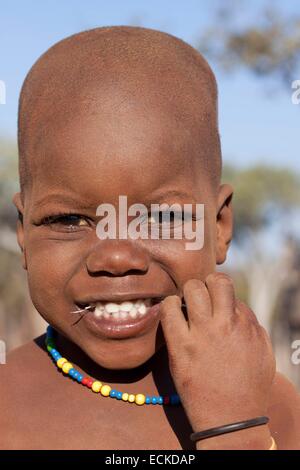 Namibia, Kunene region, Kaokoland, Himba village near Kamanjab, Himba child Stock Photo