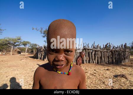 Namibia, Kunene region, Kaokoland, Himba village near Kamanjab, Himba child Stock Photo