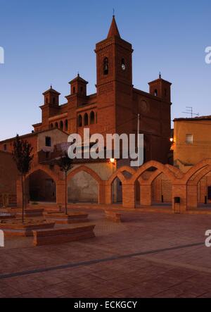 Spain, Aragon, Zaragoza, Torralba de Ribota, Saint Felix, listed as World Heritage by UNESCO, overview and church square at dawn Stock Photo