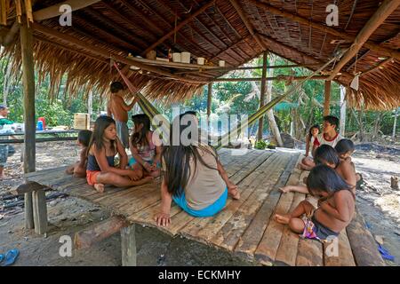 Brazil, Amazonas state, Amazon river basin, Indian of the Apurina tribe, youngs girls in the house Stock Photo