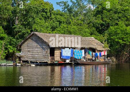 Brazil, Amazonas state, Amazon river basin, Floating house on the Purus river Stock Photo