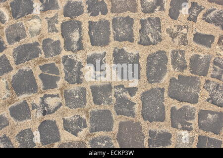 real stone pavement texture on urban pedestrian path Stock Photo
