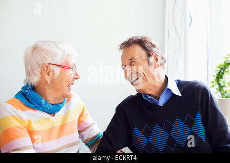 Happy senior couple spending leisure time at nursing home Stock Photo