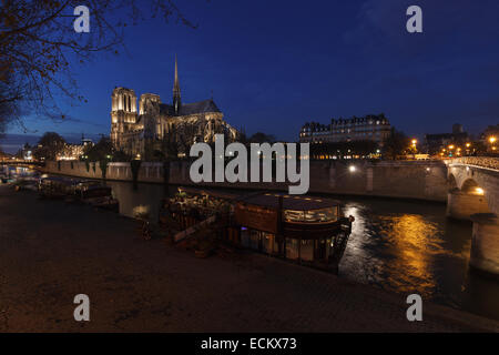 View of Notre Dame cathedral and the Seine River by dusk. Paris, France. Stock Photo