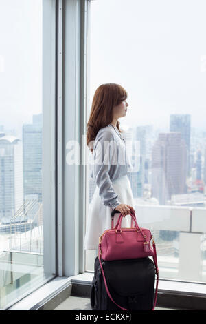 A working woman in an office building. Stock Photo