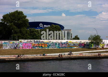 The East Side Gallery and O2 World arena seen from the Spree River. Stock Photo