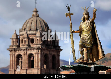 Sculpture of Patacutec (dome of La Merced dome in backgroud), Plaza de Armas, Cusco, Peru Stock Photo