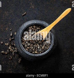 Composition with dry tea on dark background Stock Photo
