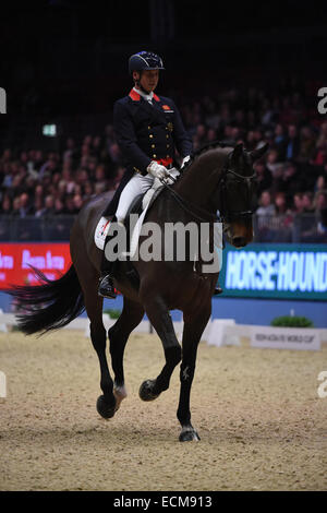 London, UK. 17th Dec, 2014. Olympia London Horse Show-Reem Acra FEI World Cup dressage leg grand prix. British rider Carl Hester and Nip Tuck 4th Place Credit:  Action Plus Sports/Alamy Live News Stock Photo