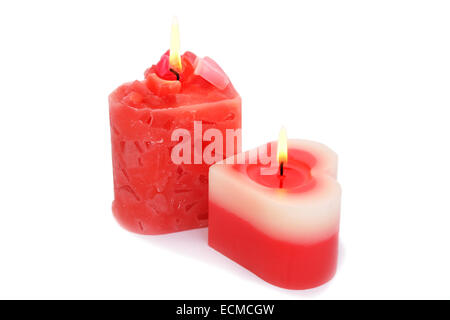 Red candles isolated on white background.