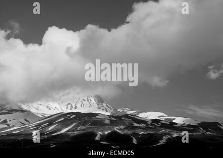 Clouds breaking over the slopes of Erciyes Dagi a volcano and ski resort in Turkey Stock Photo