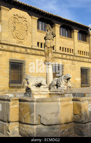 Fountain of the lions and Antigua Carnicería, old butcher's shop, at Populo square, Baeza, Jaen province, Andalusia, Spain Stock Photo