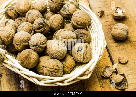 Fresh ripe walnuts in a basket Stock Photo