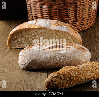 Fresh bread on wooden table Stock Photo