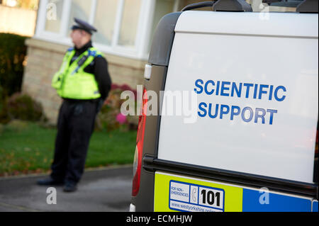 UK Police officer and Scientific Support Unit, CSI Unit. Stock Photo