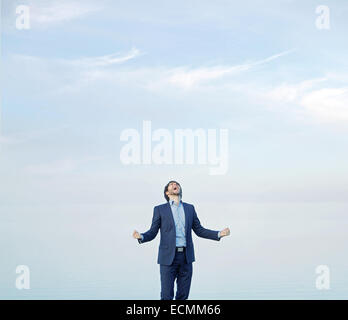 Successful guy over the sky background Stock Photo