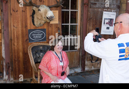 Bergen Norway Bryggen tourists taking picture in front of moose head MR-12 Stock Photo
