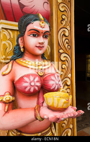 Mauritius, Mahebourg, Hindu temple, colourfully painted figure at entrance Stock Photo