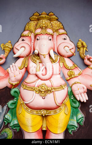 Mauritius, Mahebourg, Hindu temple, colourfully painted multi headed figure of elephant god Ganesh Stock Photo