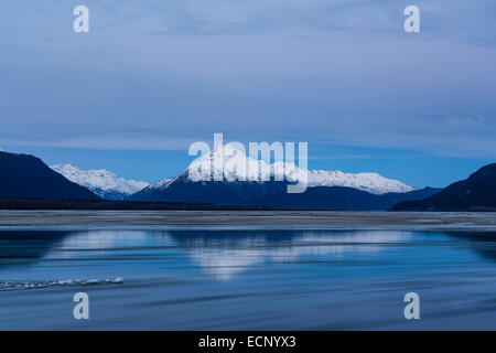 Twilight along the Chilkat River with the Chilkat Mountains in the Chilkat Bald Eagle Preserve in Haines, Alaska. Stock Photo