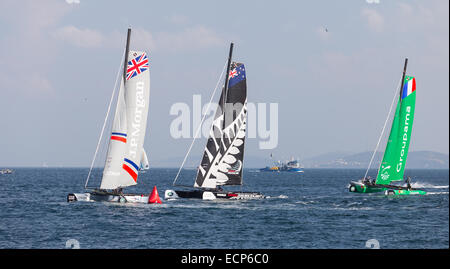 ISTANBUL, TURKEY - SEPTEMBER 14, 2014: Emirates Team New Zealand, J.P. Morgan BAR and Groupama teams compete in Extreme Sailing  Stock Photo