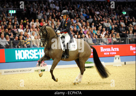 London, UK. 17th Dec, 2014. Charlotte Dujardin (GBR) riding Valegro breaking the world record during the Reem Acra FEI World Cup Dressage Freestyle to Music at Olympia 2014, the London International Horse Show at Olympia, Kensington, United Kingdom on 17 December 2014. Credit:  Julie Badrick/Alamy Live News Stock Photo
