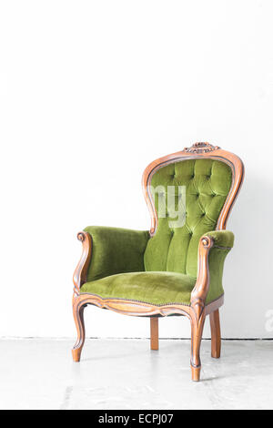 Green classical style Armchair sofa couch in vintage room Stock Photo