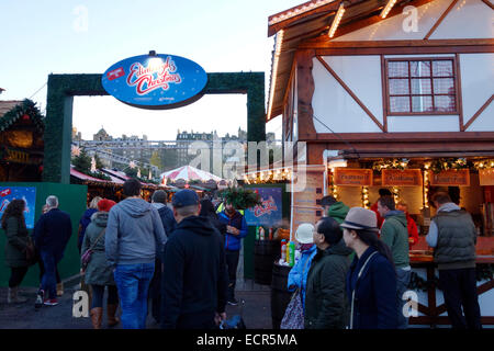 People entering the Edinburgh Christmas Market on Princes Street Stock Photo