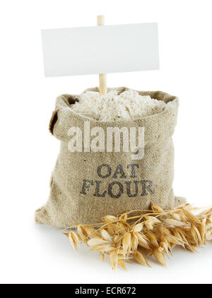 Oat flour in small linen sack. Empty space for your text Stock Photo