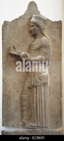 Greek Art. Classical Era. Grave stele of Amphotto, from Thebes, 440 B.C. Boetian limestone. The dead woman is depicted facing left and holding a flower in the right hand and a fruit in the left. National Archaeological Museum. Athens. Greece. Stock Photo