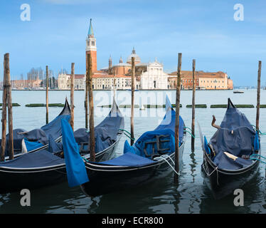 Basilica di san Giorgio Maggiore as seen from behind parked gondolas at  St Mark's square, Venice, Italy Stock Photo